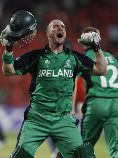Ireland's John Mooney celebrates their win over England after hitting the winning shot during the...