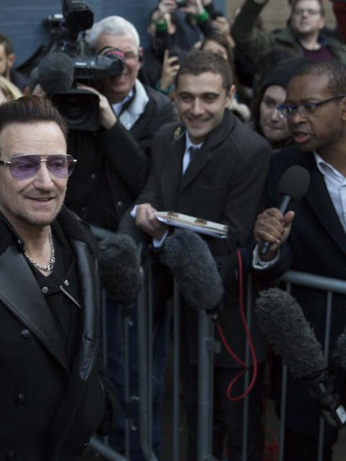 Irish band U2's lead singer, Bono, leaves the recording of the Band Aid 30 charity single in west...