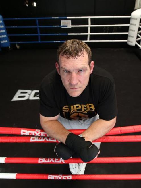 Irish boxer Martin Rogan relaxes in the ring. He is preparing for the Super 8 tournament on...