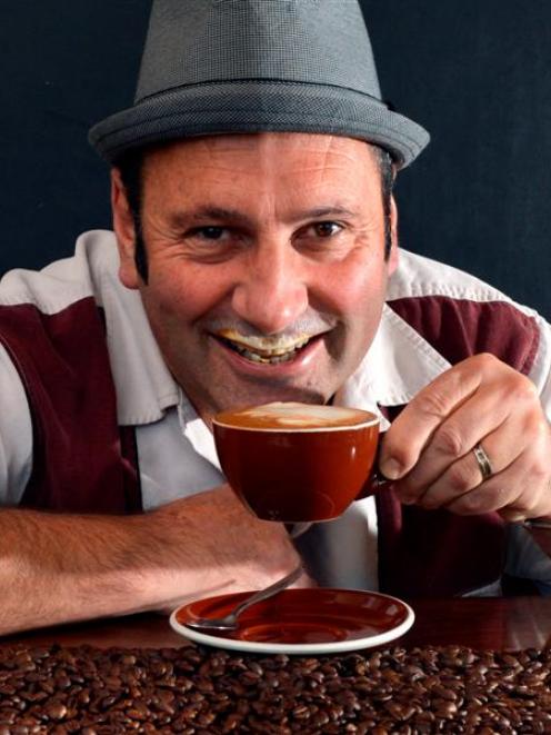 Ironic Cafe co-owner Steve Wilson samples his award-winning Evoke coffee blend yesterday. Photo...