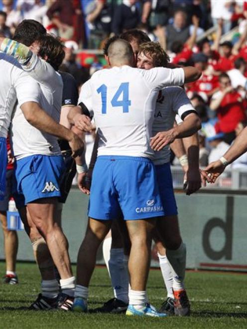 Italian players celebrate beating Scotland in their Six Nations match in Rome earlier this month....