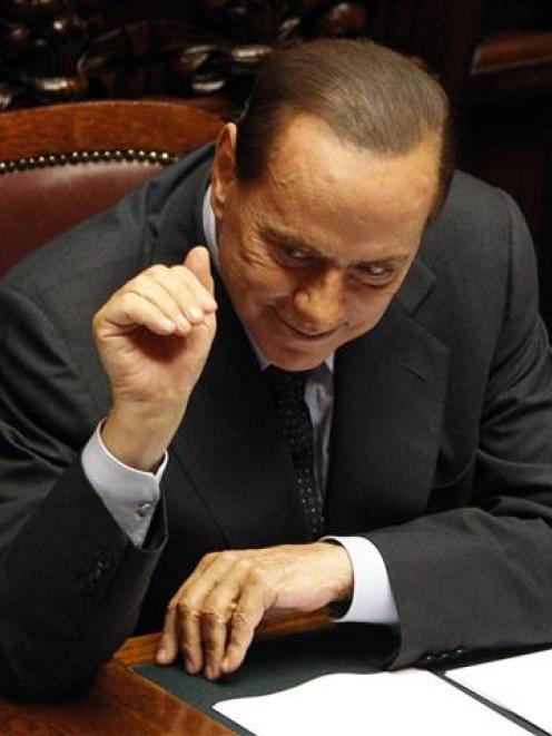 Italy's Prime Minister Silvio Berlusconi is under renewewd pressure. REUTERS/Max Rossi