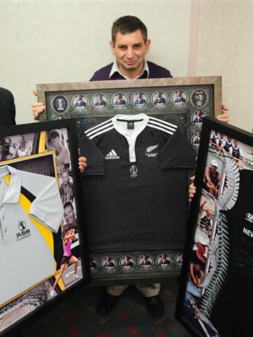 Items to be auctioned this Friday night at the Otago Sports awards are (from left) a Maria...