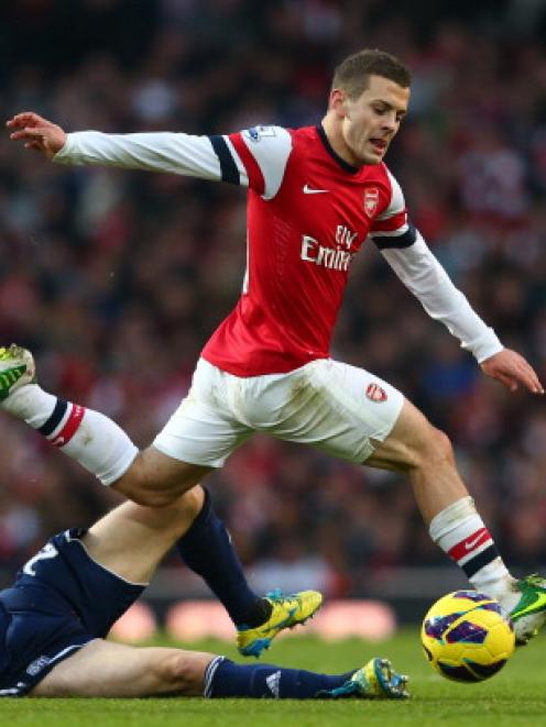 Jack Wilshere in action for Arsenal against West Bromwich 
...