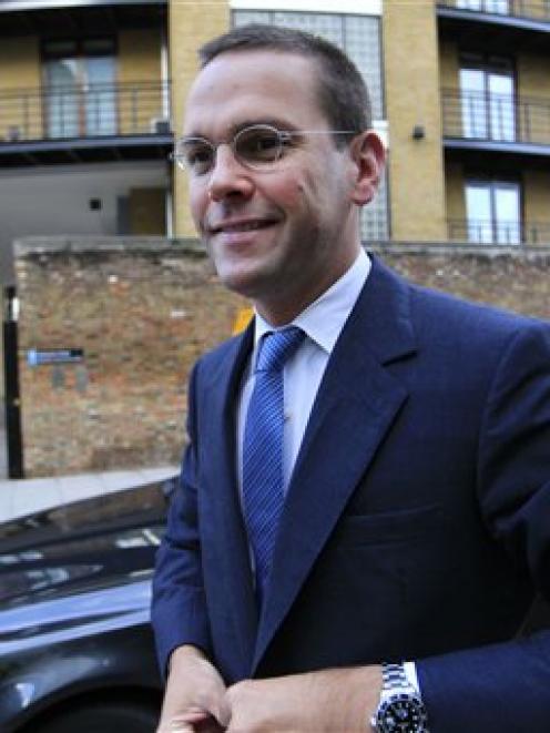 James Murdoch seen arriving at News International headquarters in London in July. (AP Photo/Sang...
