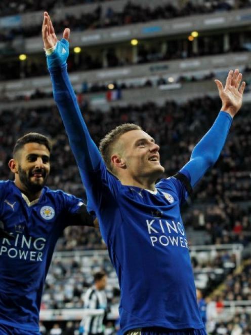 Jamie Vardy celebrates scoring for Leicester City to equal the record for scoring in consecutive...