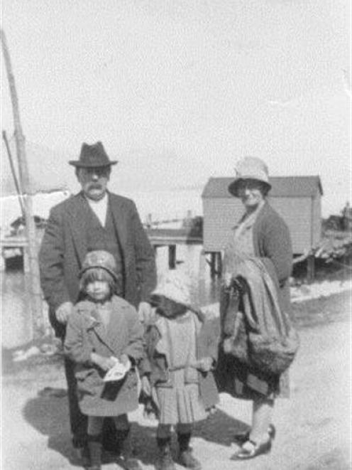 Janet Smith as a young girl, with her parents Neil and Lenore Cook and sister Lenore (left), all...