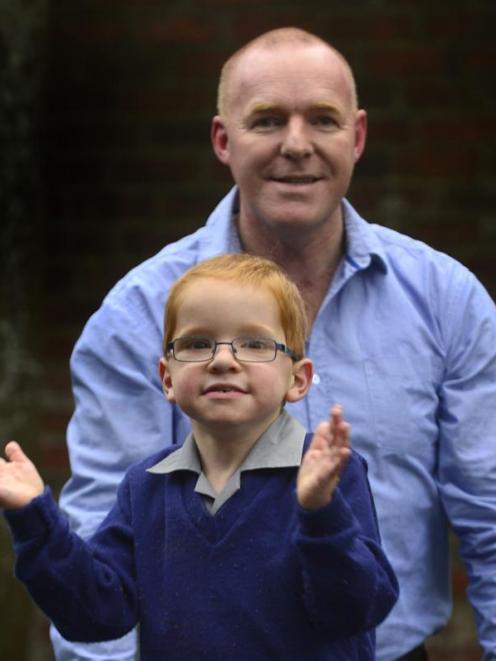 Jason May and son Sinclair at home in Dunedin. Photo by Peter McIntosh.