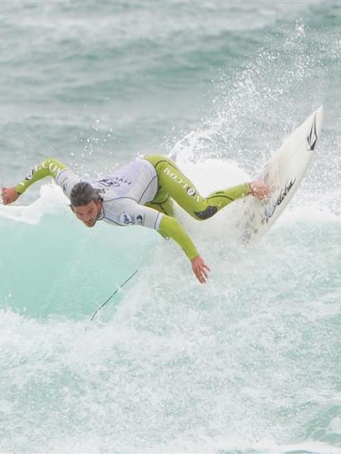 Jay Quinn on his way to winning the men's open final at the New Zealand surfing championships at...