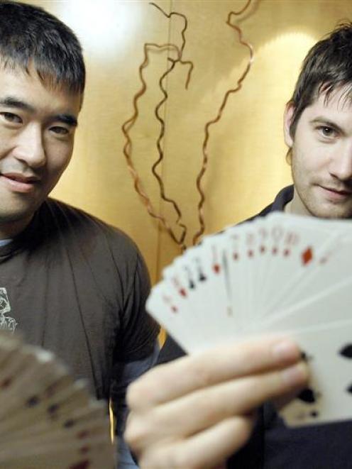 Jeff Ma, left, who won nearly $1 million at blackjack tables while a student at MIT, is portrayed...