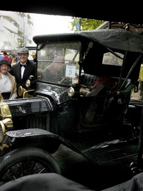 Jenny and Murray Pryde stand with their 1915 Model T Roadster in the Octagon at the start of the...