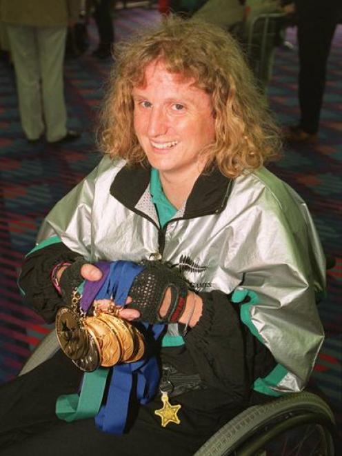 Jenny Newstead shows off the medals she won at the 1996 Olympic Games. Photo from the <i>ODT</i>...