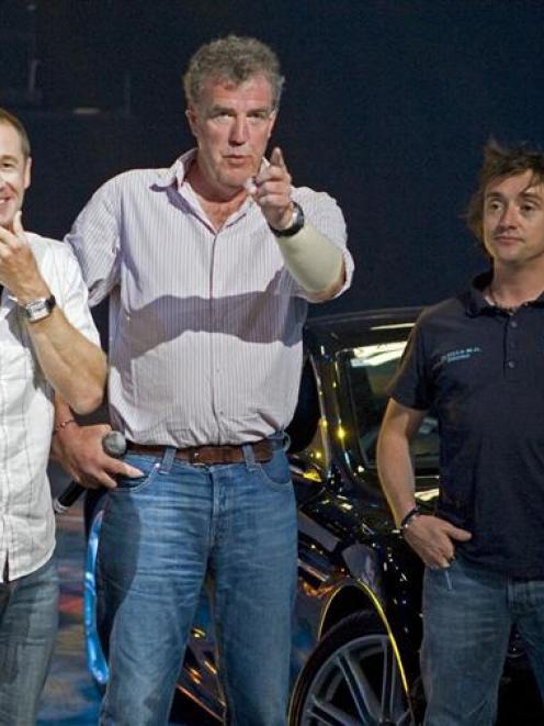 Jeremy Clarkson (centre) is flanked by Greg Murphy (left) and Richard Hammond at the Top Gear...