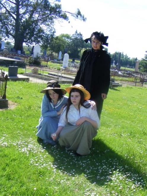 Jess Ransom, Alya McLean and Carol Krueger at Minnie Dean's unmarked grave at Winton Cemetery.