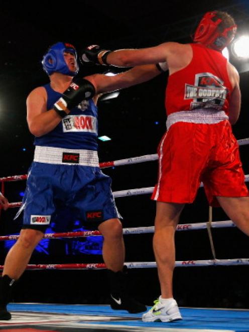 Jesse Ryder and Mark Watson in action during their boxing bout at Sky City Convention Centre in...