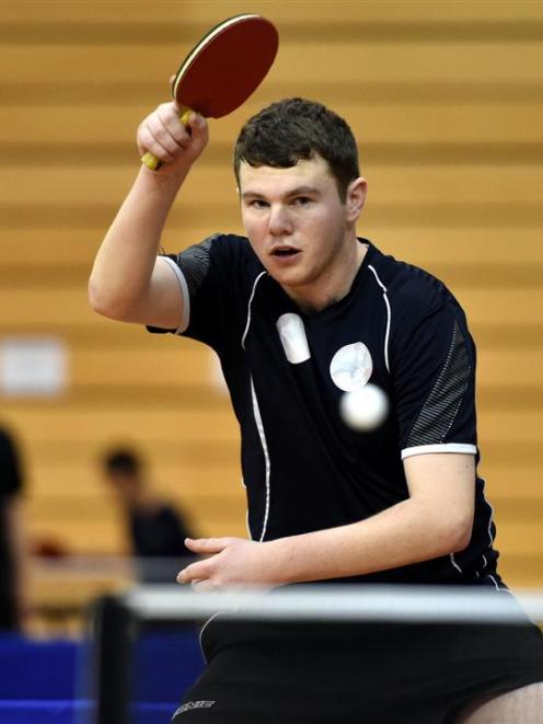 Jesse Wilson, from Canterbury, returns a shot during a game in the Otago Open at the Edgar Centre...