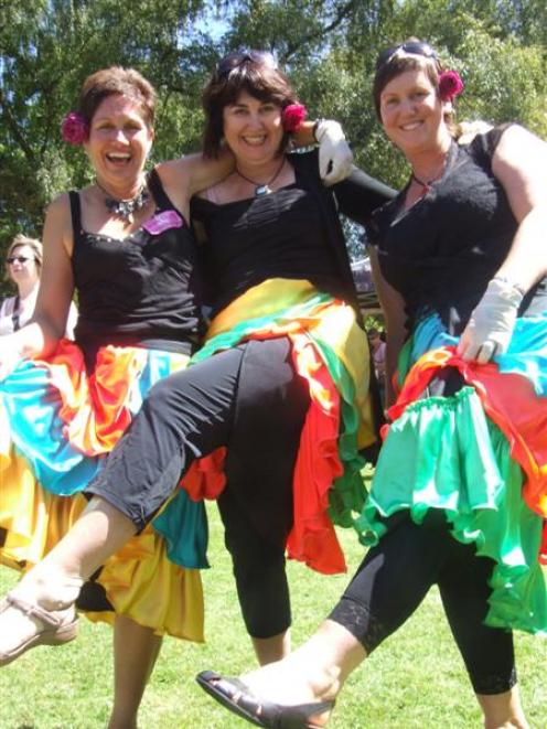 Jill Squire (left), Jude Robertson and Leanne Kingan dressed flamenco-style to serve an...