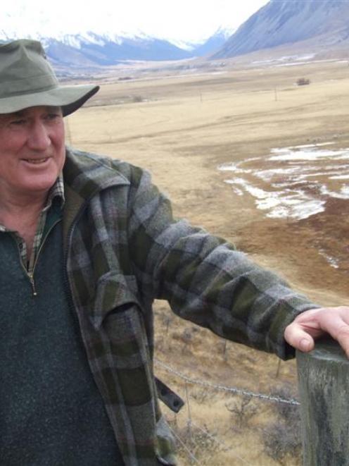 Jim Morris at home in the Ahuriri Valley. To the left is a wetland area he has fenced off for...