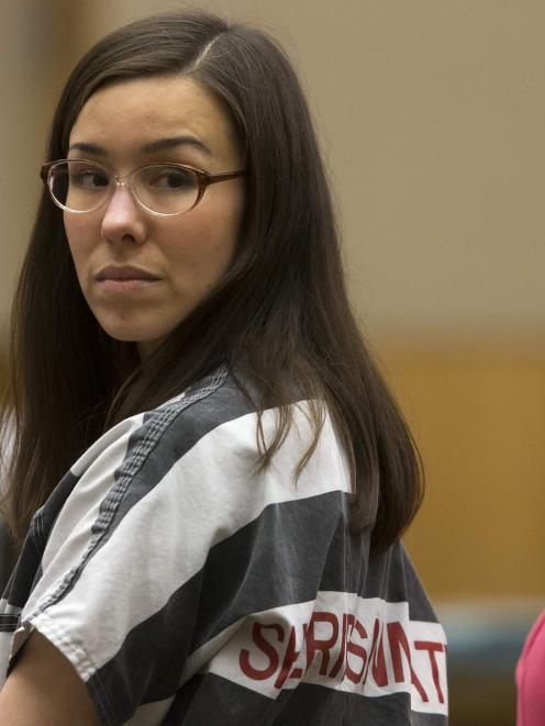 Jodi Arias (L) and her attorney Jennifer Willmott (R) look back during sentencing hearing in...