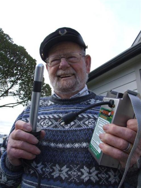 John Brown holds a Newtek Pacifier, which he has been selling to dairy farmers in North Otago....