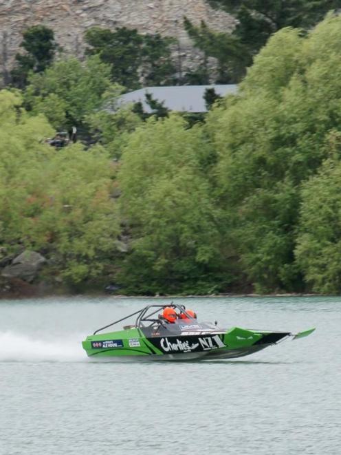 John Derry crosses the finish line  at Cromwell yesterday to win the World Jet Boat Marathon....