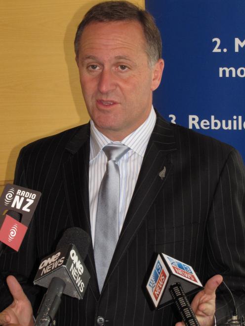 John Key answers questions in Queenstown today. Photo by James Beech