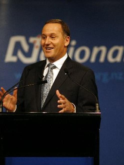 John Key gives his conference address in Auckland yesterday. Photo by NZ Herald.