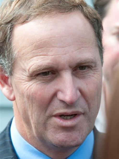 John Key used an Air Force Iroquois on Saturday to attend the Hamilton V8s then a black tie...