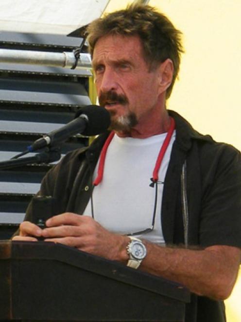 John McAfee says police in Belize want to frame him for the murder his neighbour Gregory Faull....