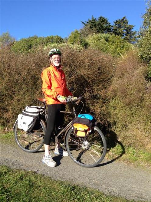 John Smithies (72) with the 1940s bike on which he will be riding the length of New Zealand....