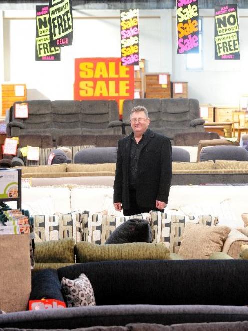 John Williamson, owner of John's Furniture Warehouse, in the shop in Stafford St, Dunedin. Photo...