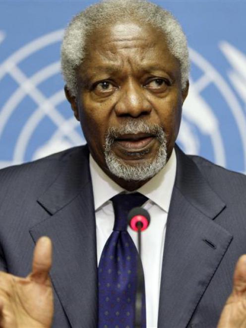 Joint Special Envoy of the United Nations and the Arab League for Syria Kofi Annan gestures...