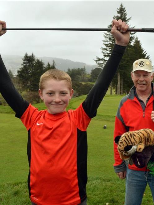 Joseph Hancock yesterday celebrates winning the Waikouaiti Golf Club senior championship  while...