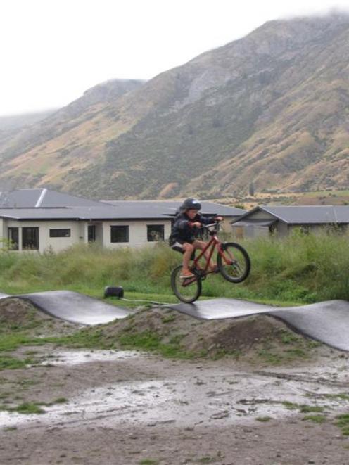 Josh Bonnar (8), of Lake Hayes Estate, gets to grips with McBride Park's new  track,  which was...