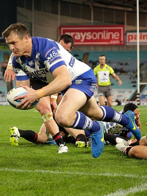 Josh Morris goes over to score for the Bulldogs. Photo Getty Images