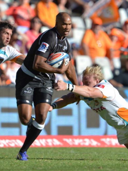 JP Pietersen of the Sharks on the charge against the Cheetahs in their Super 15 match at Free...