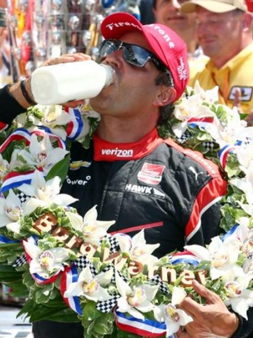 Juan Pablo Montoya celebrates after winning the Indianapolis 500 earlier this year.