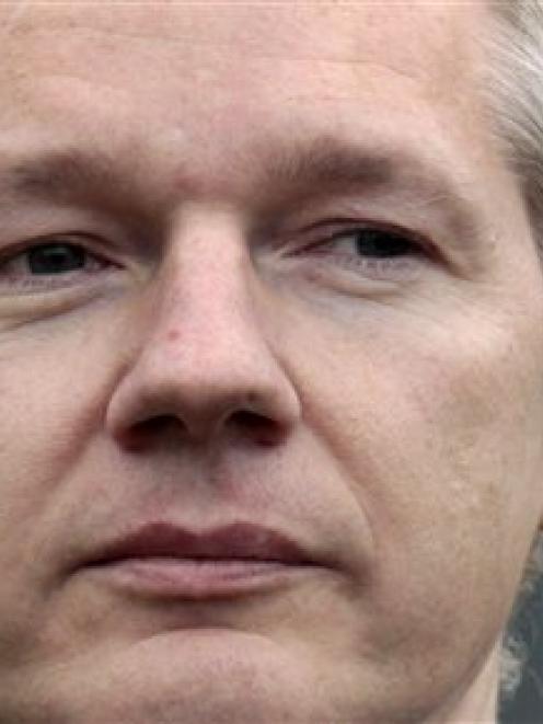 Julian Assange faces the media after making an appearance at Belmarsh Magistrates' Court in...