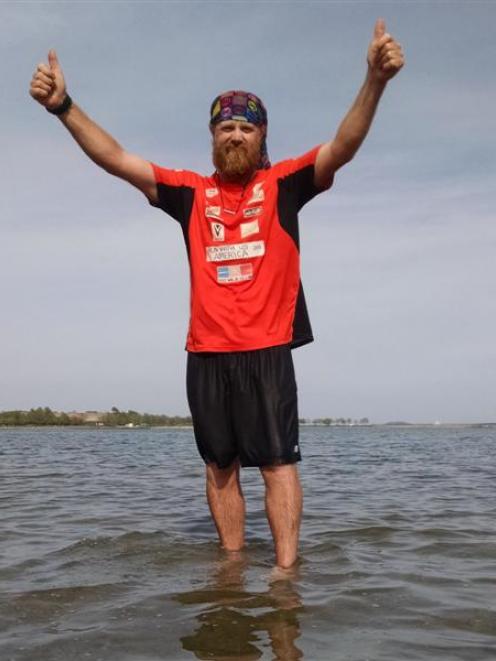 Jup Brown takes a dip in the Atlantic Ocean at Boston in May, to celebrate the end of his charity...