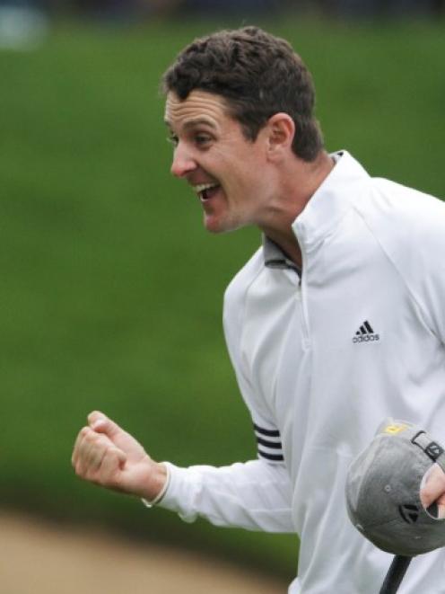 Justin Rose of Britain celebrates winning the PGA Tour FedExCup BMW Championship golf tournament...