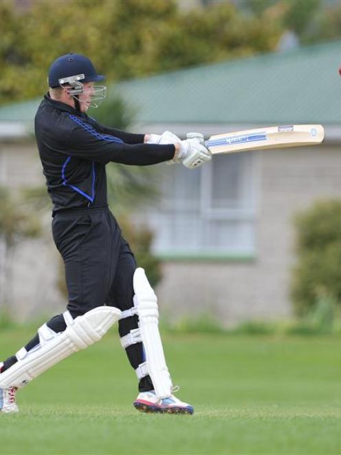 Kaikorai batsman Geordie Scott hits out during his innings of 37 against Carisbrook-Dunedin at...
