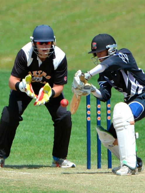 Kaikorai batsman Saj Senadeera looks to guide the ball through the off side during the Otago...