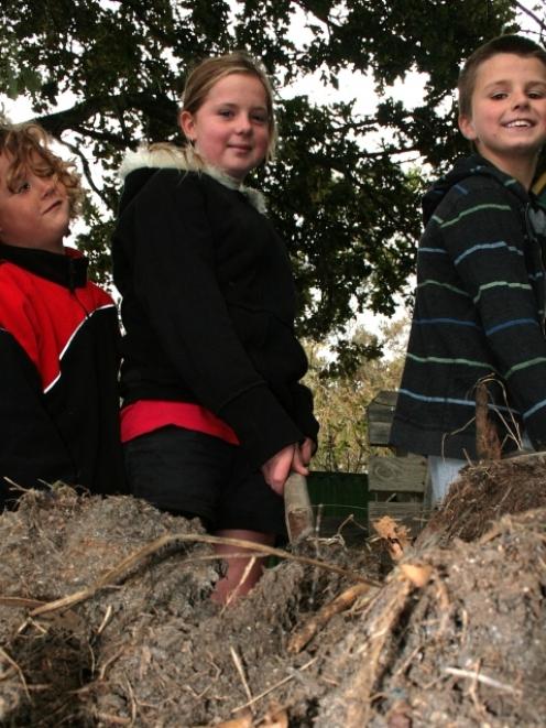 Karitane School pupils (from left)  Louis Farrant (7), Izabella Carter (10) and Kahlil Grocott (9...