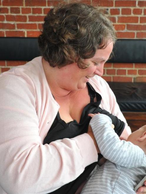 Kathryn Whitwell, of Dunedin, breast-feeds her 6-month-old son, Hugo Anstey, at the Burp launch...