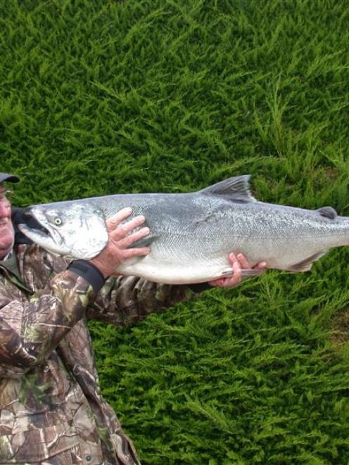 Keen salmon angler Kevin Coutts, of Dunedin, with the 9.57kg salmon he caught "somewhere in the...