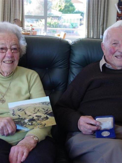 Keith Philip (87) holds the champion fleece medal he received in 1988 from the Royal Agricultural...