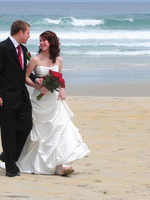 Kelly Mullen, of Canada, wore jandals for her Dunedin beach wedding to Canadian beau Jeff Dennis...