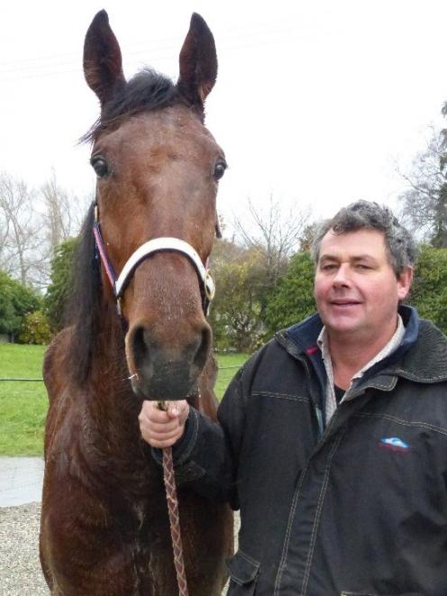 Kenny Baynes with debut maiden winner Diamond King at Gore on Saturday. Photo: Matt Smith