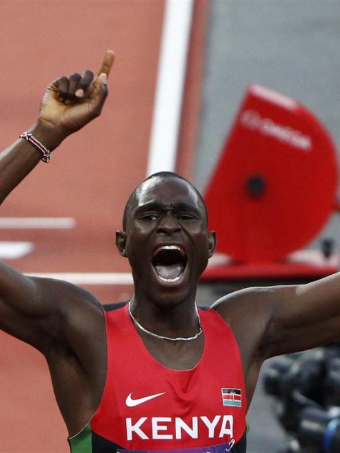 Kenya's David Lekuta Rudisha celebrates after setting a world record win the men's 800m final.  ...