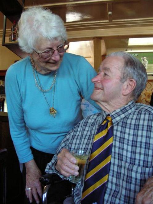 Kevin and Brida Dowling, of Ophir, share a moment of celebration after being made life members of...
